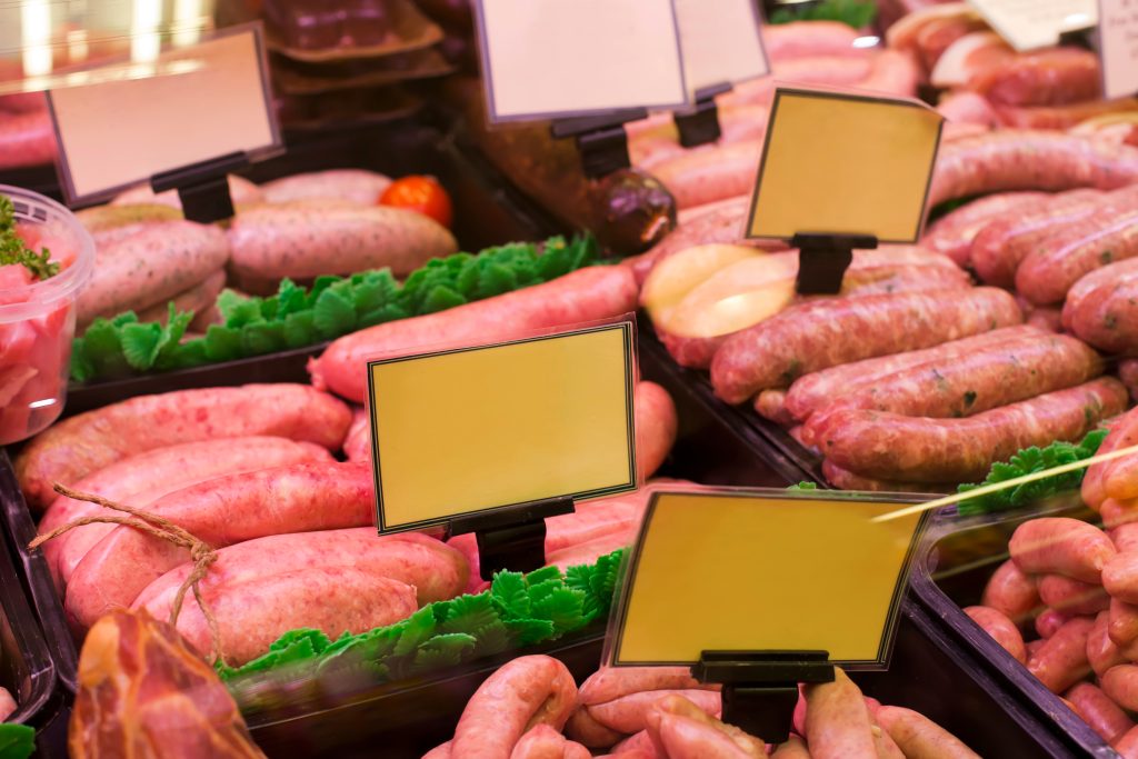 Grocery giants have "bombarded" customers with inaccurate messages overstating the carbon footprint of meat, a trade body has said