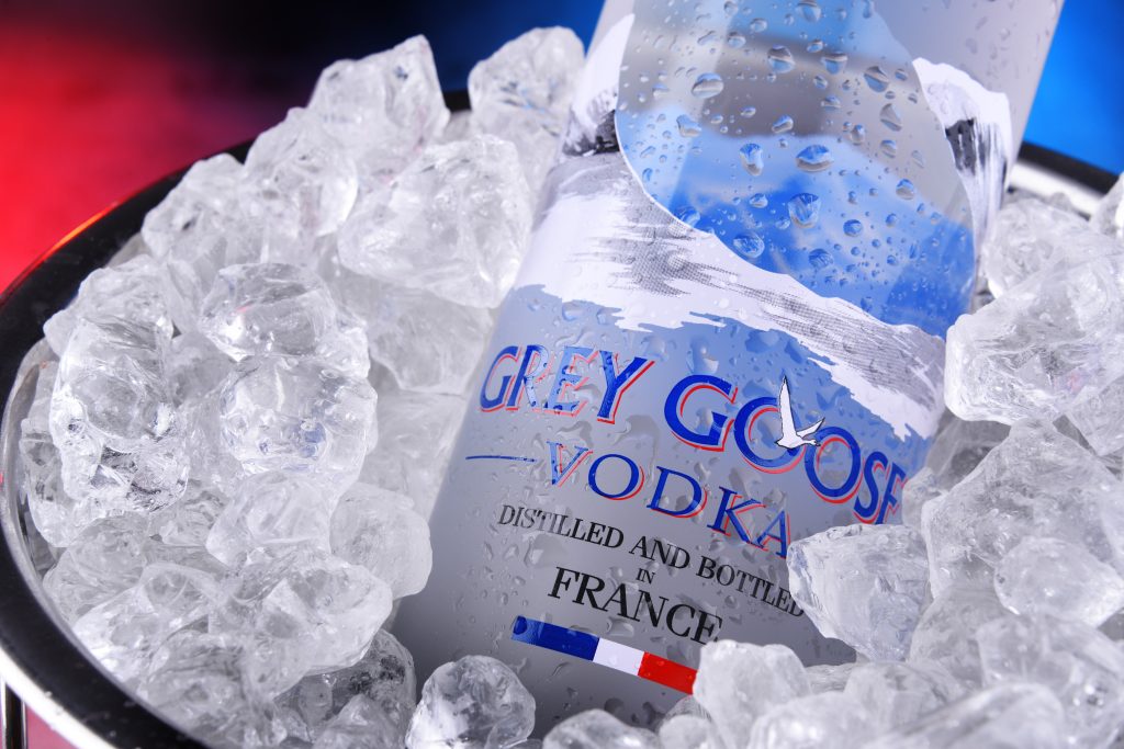 The company behind Bombay Sapphire gin and Grey Goose vodka is set to halve the plastic in its Christmas gift packs
