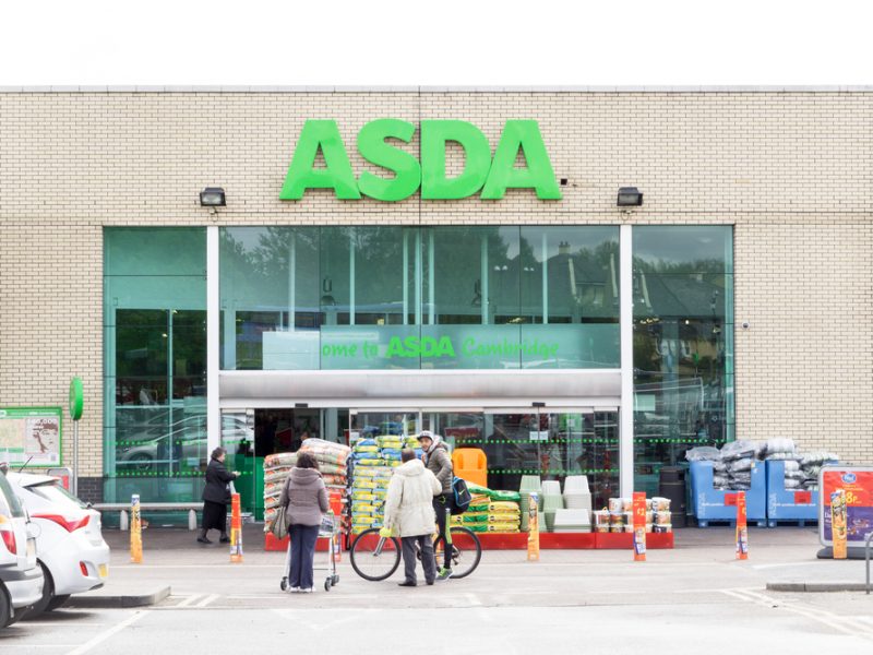 Customers shopping outside Asda