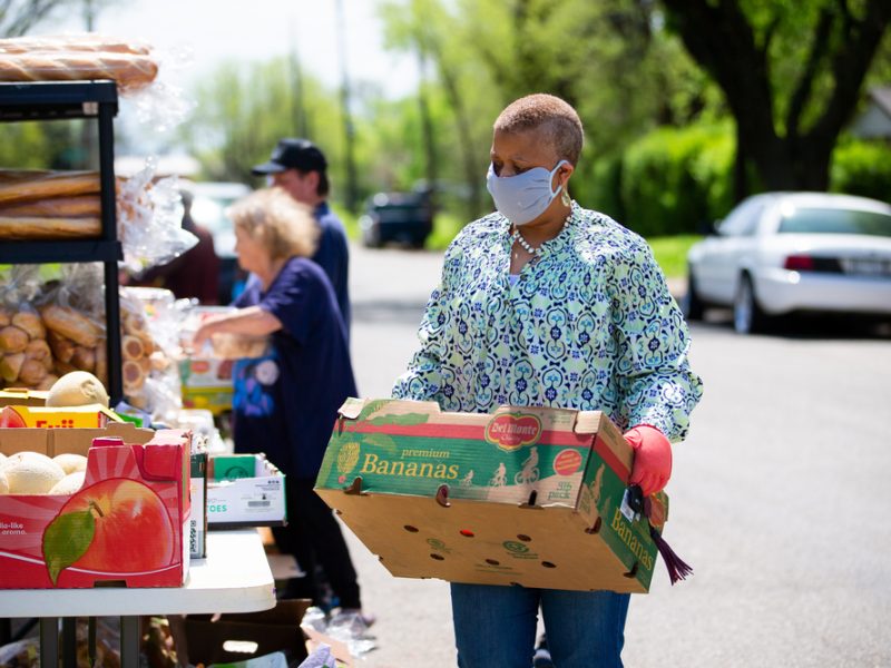 A helper at a food bank