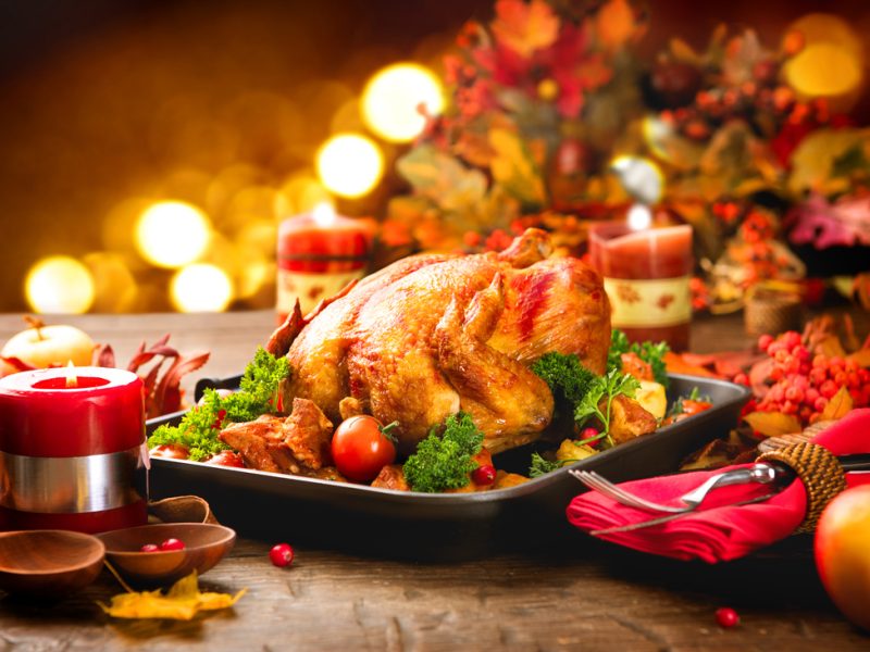 A Christmas dinner with a roast turkey and trimmings.