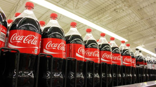 Coca Cola on shelves in supermarket