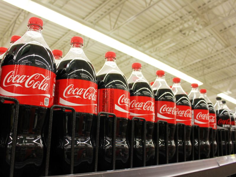 Coca Cola on shelves in supermarket