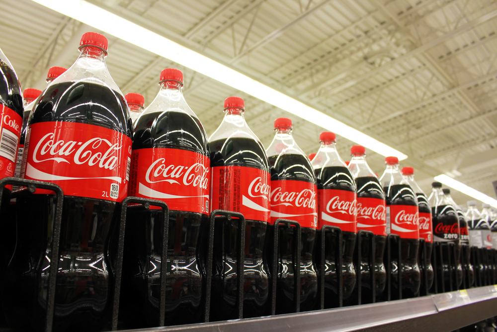 Coca Cola on shelves in supermarket