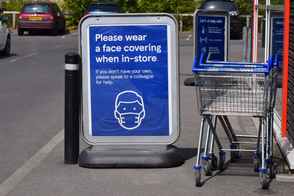 supermarket covid mask sign