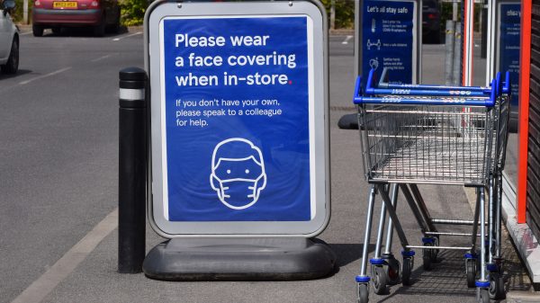 supermarket covid mask sign