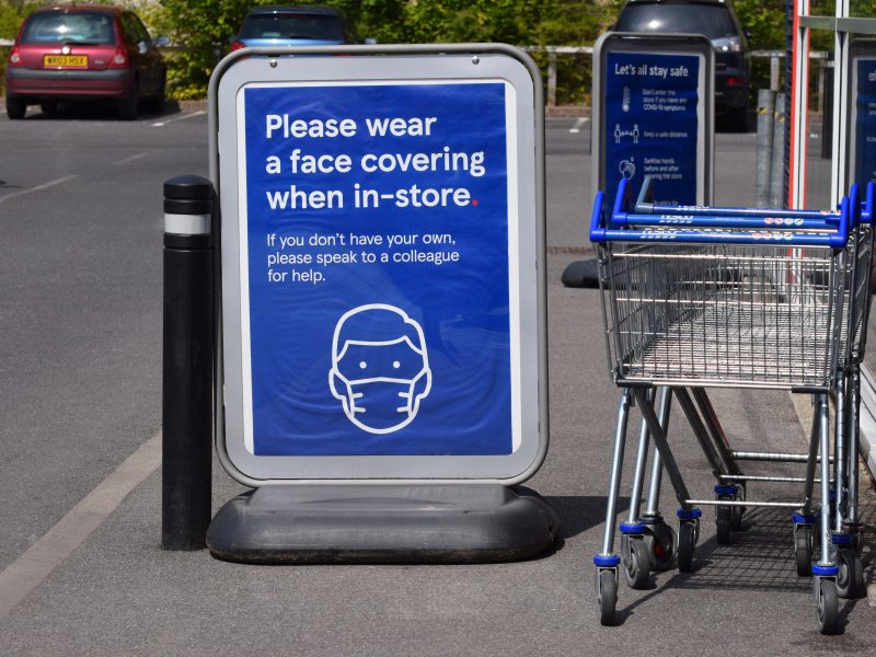 supermarket covid mask sign
