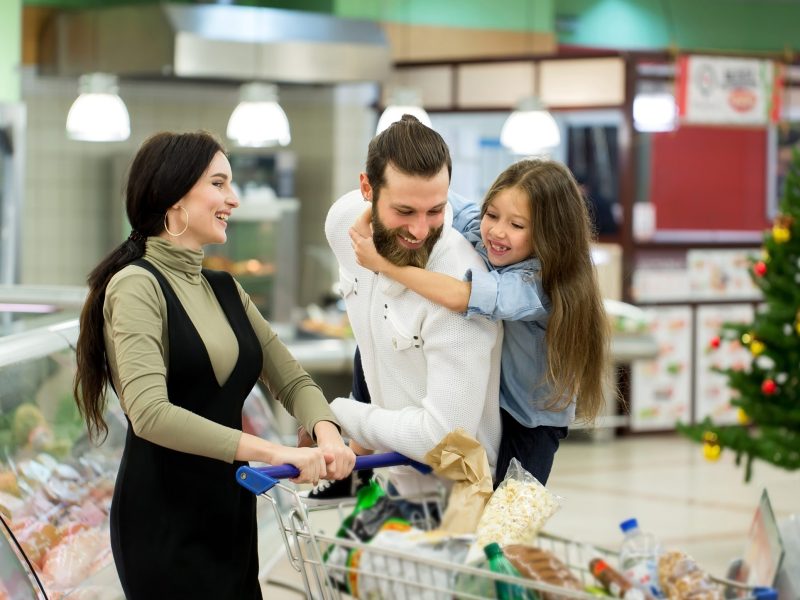 Family doing their supermarket Christmas shopping