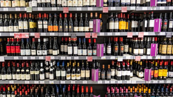 Shelves of red wine in a UK supermarket.