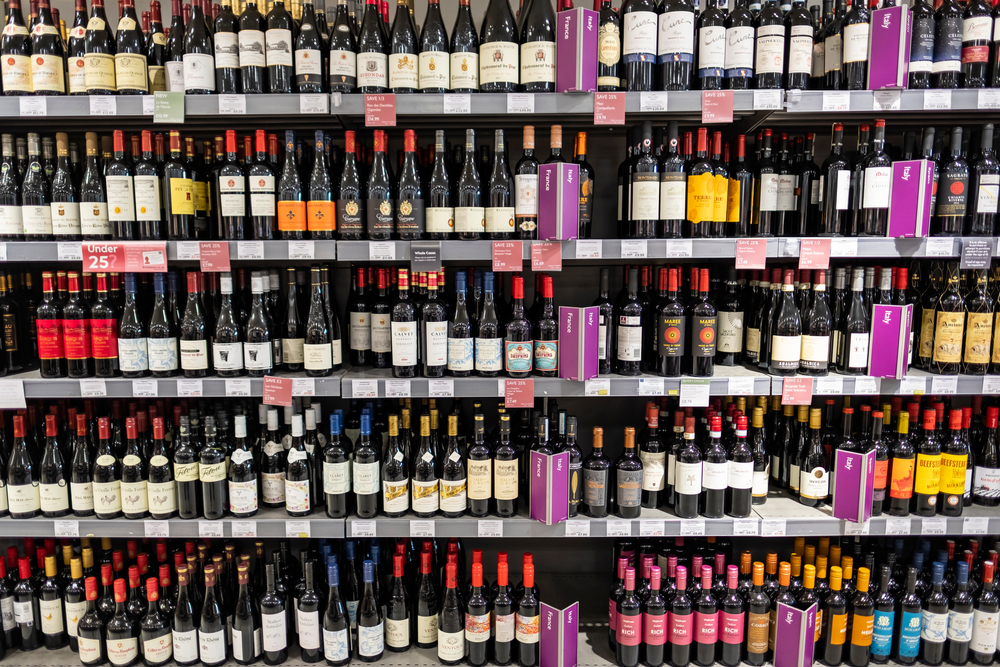 Shelves of red wine in a UK supermarket.