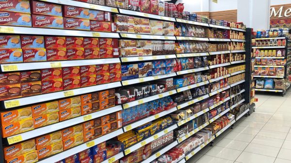 A row of Pladis McVitie's products in a supermarket.
