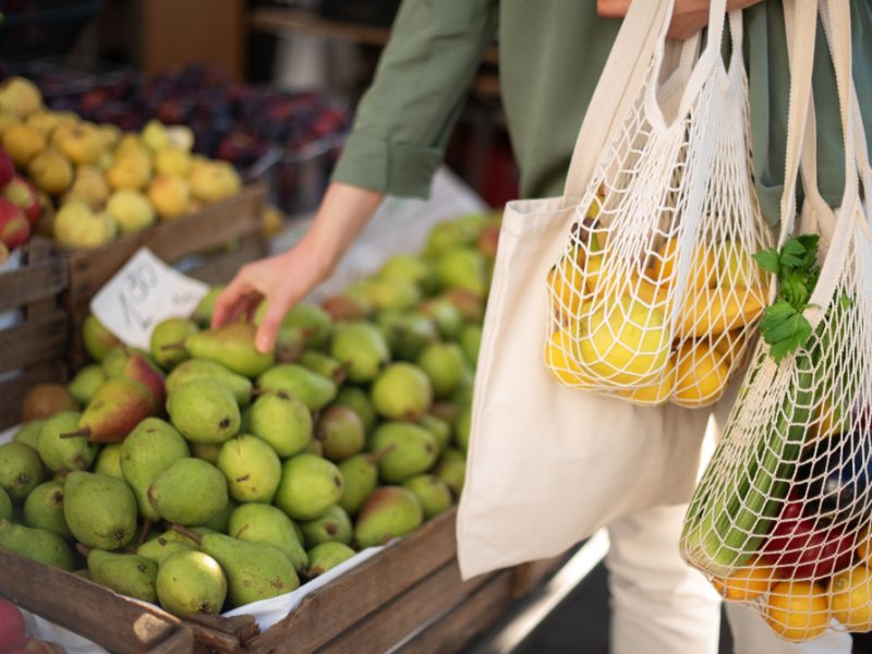 Customer shopping with a reusable bag