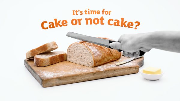 Sainsbury's "Cake or not cake" featuring someone slicing a loaf of bread