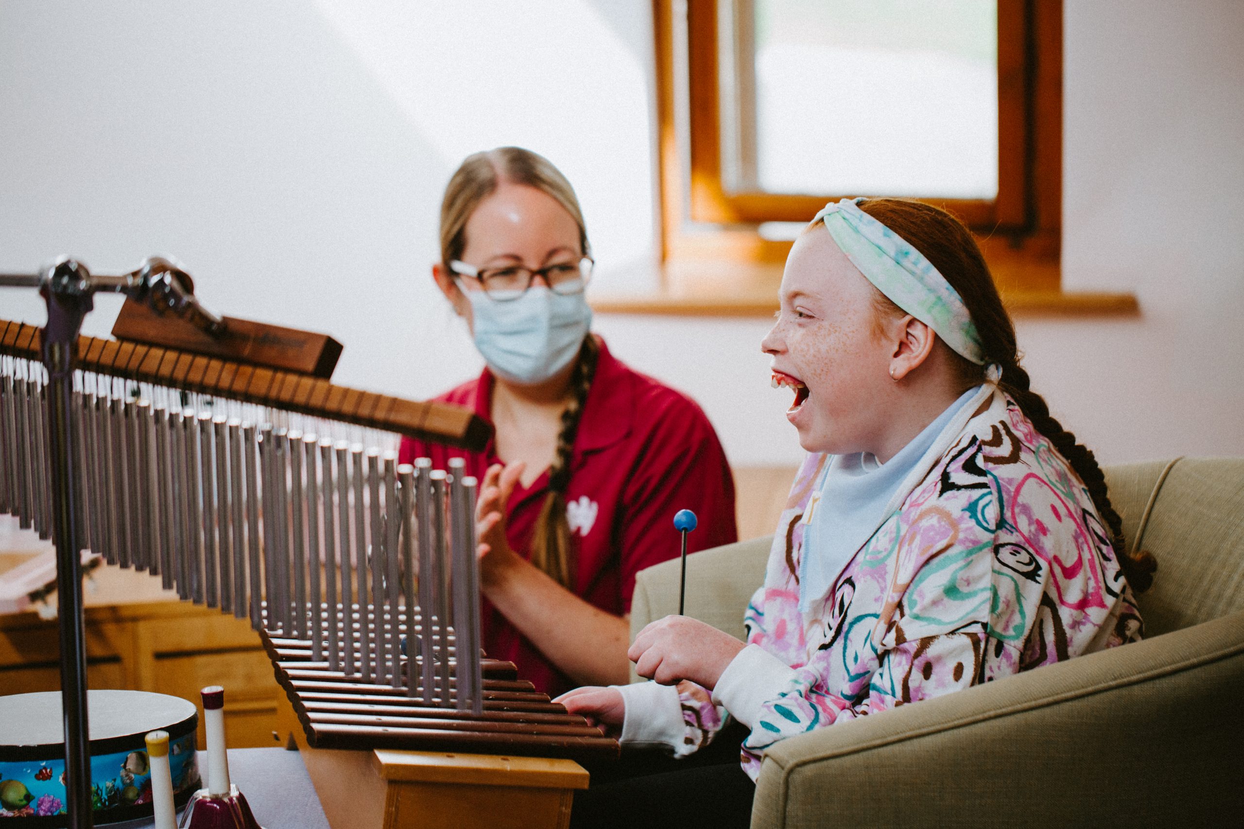 child undergoing music therapy thanks to donation through Nisa's charity