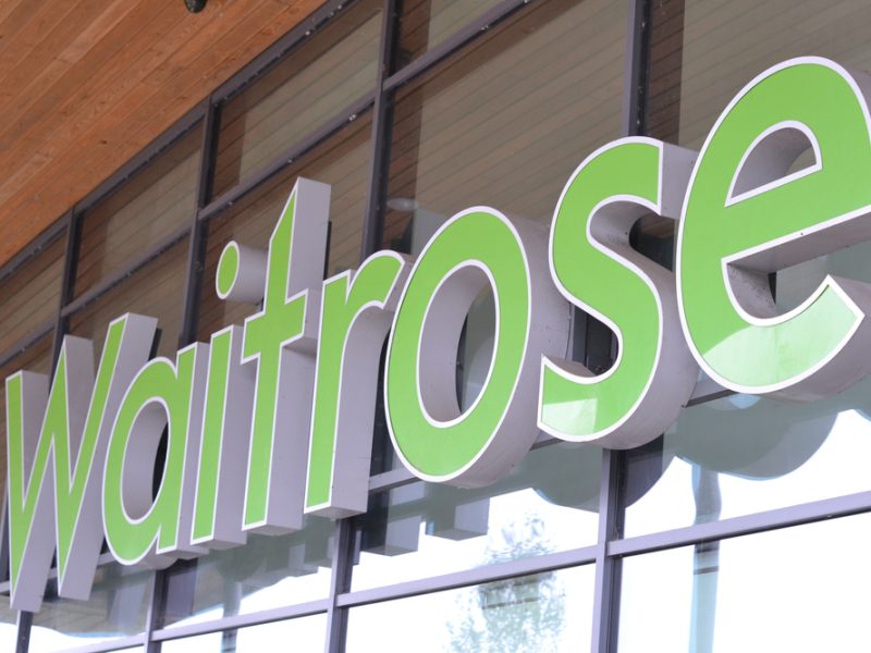Waitrose sign outside supermarket