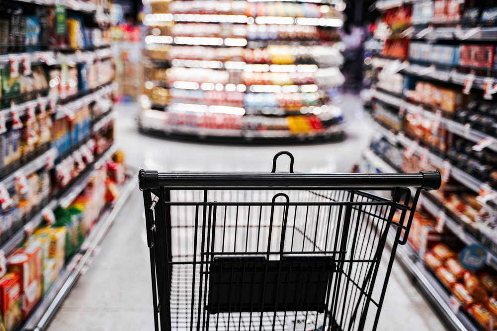 An empty shopping trolley in a supermarket.