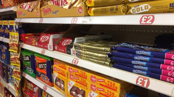Shelves of chocolate in a store.