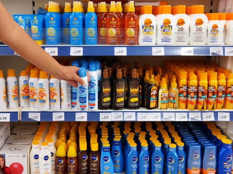 A sun cream aisle in a supermarket