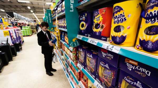 A child browses Tesco's Easter egg section.