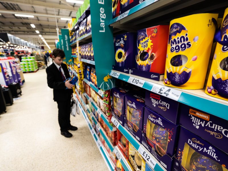 A child browses Tesco's Easter egg section.
