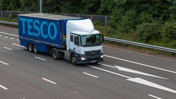 A Tesco truck on a motorway.