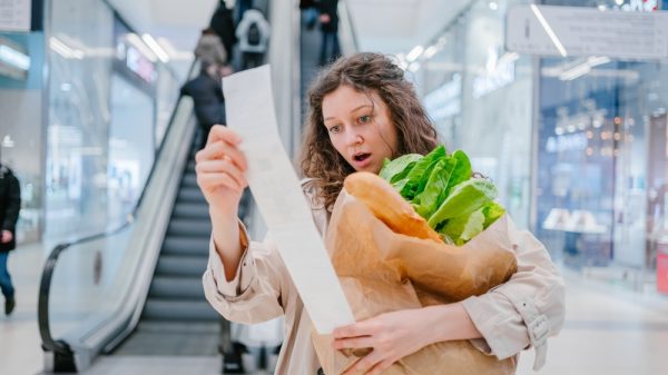 Customer in shock after looking at grocery shopping receipt