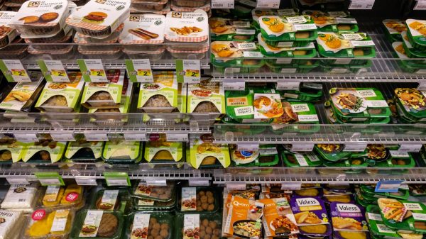 A chilled aisle of plant-based products.