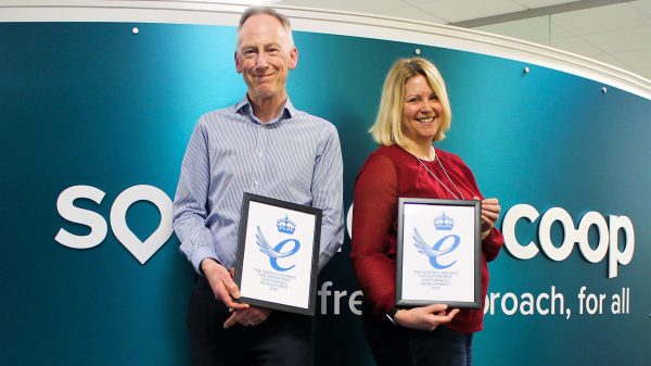 Mark Smith and Gemma Lacey celebrate Co-op's award