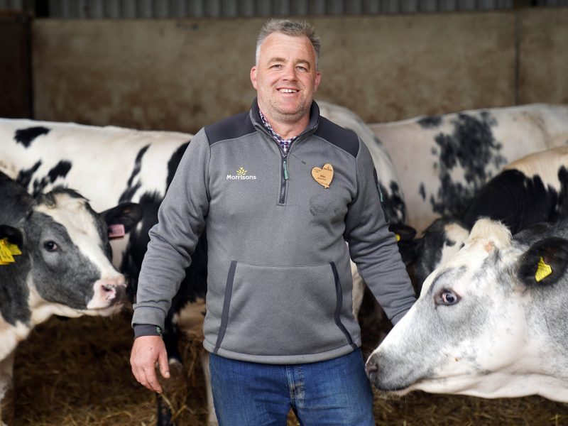 Morrisons employee in a farm