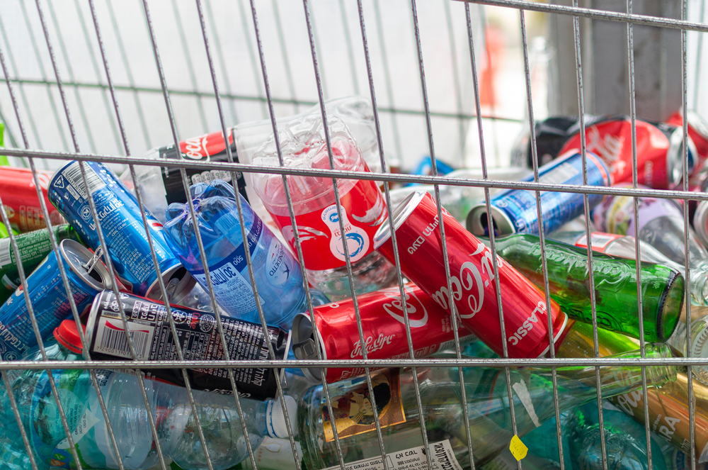empty food and drink packaging in a shopping trolley ready for recycling