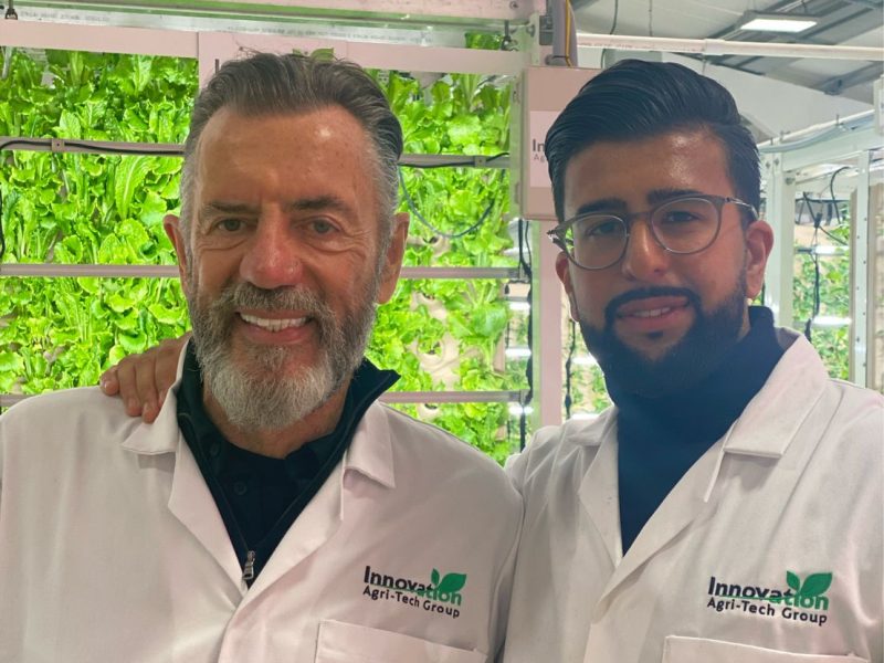 Duncan Bannatyne with an IAG employee working on vertical farming