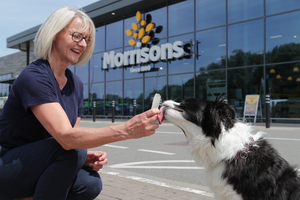Morrisons worker with dog