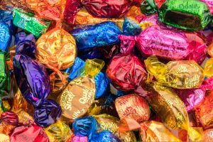 Quality street tubs are shrinking by 50g for the first time in three years as the FMCG giant Nestlé looks to cut soaring production costs.