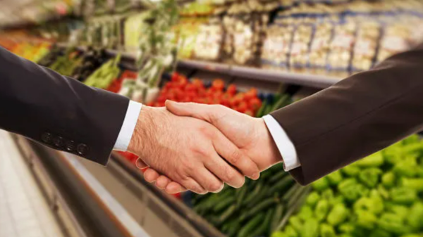 Handshake with supermarket bosses