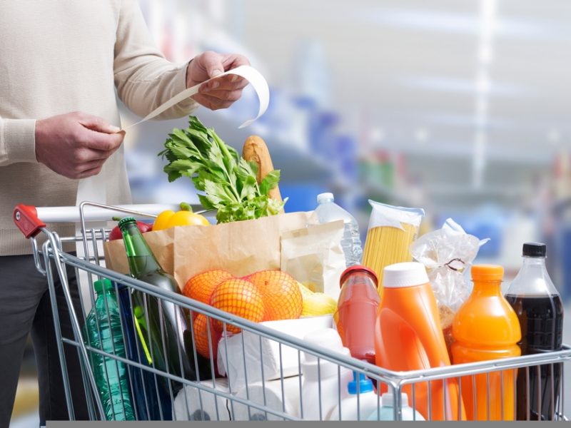 Supermarket trolley and receipt - food price inflation