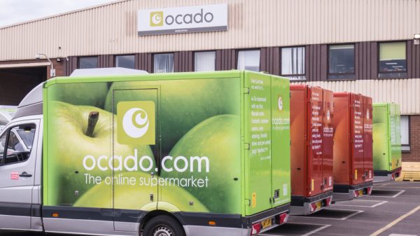 Ocado delivery vans and warehouse