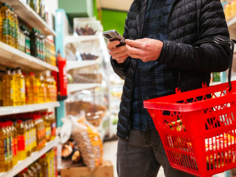 Man holding shopping basket