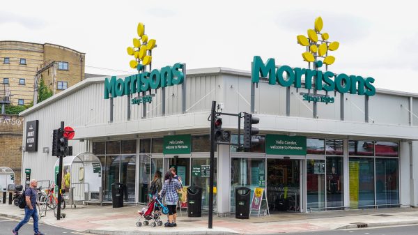 Morrisons' credit rating has been downgraded after reporting a drop in its sales and profits performance.