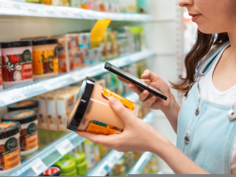 Scanning product barcode in supermarket