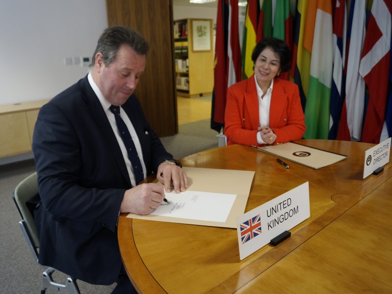 RT Hon Mark Spencer MP signing the International Coffee Agreement