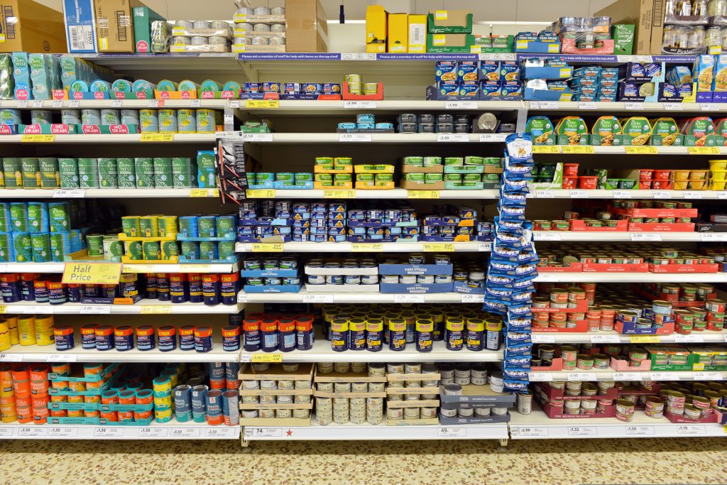 Branded canned food brands have seen volume sales drop by 18%, as cost-of-living pressures cause Brits to continue to trade down and seek cheaper alternatives.