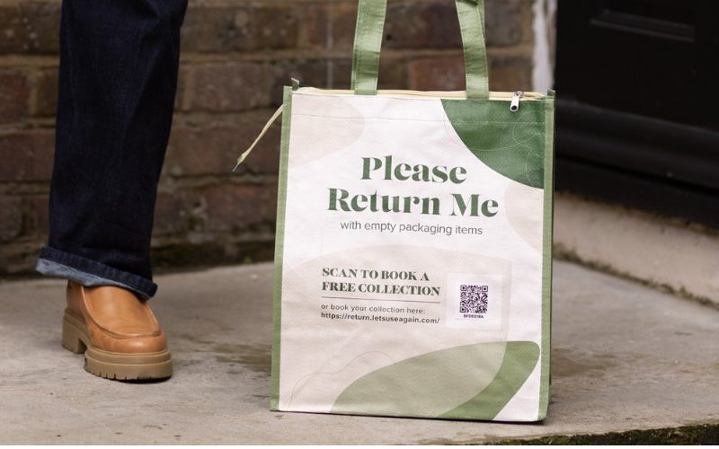 New Uber Eats packaging which says "please return me"