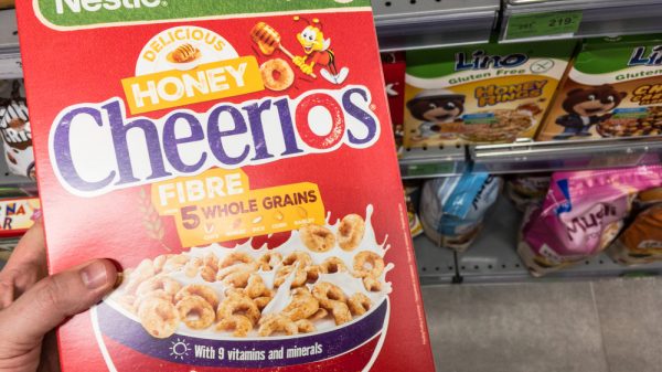 Honey Cheerios logo on boxes of Cereal for sale. Part of Nestle and General Mills