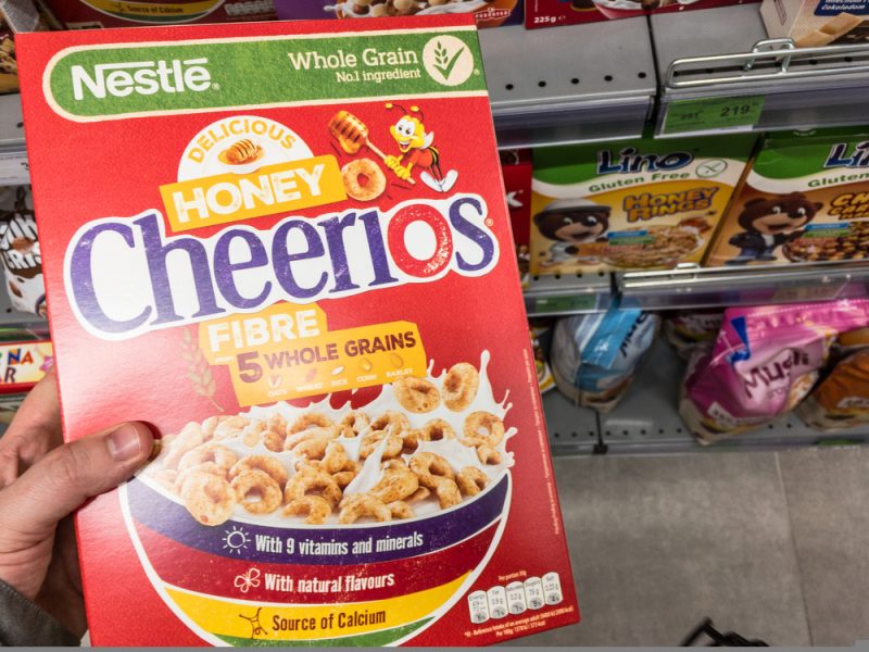 Honey Cheerios logo on boxes of Cereal for sale. Part of Nestle and General Mills