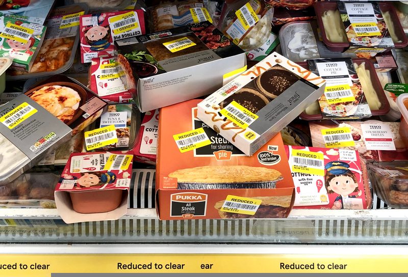 Yellow sticker food products in supermarket