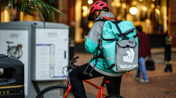 Deliveroo has expanded to add non-food categories from supermarkets to its fast delivery service in a bid to drive growth, here depicting a deliveroo rider