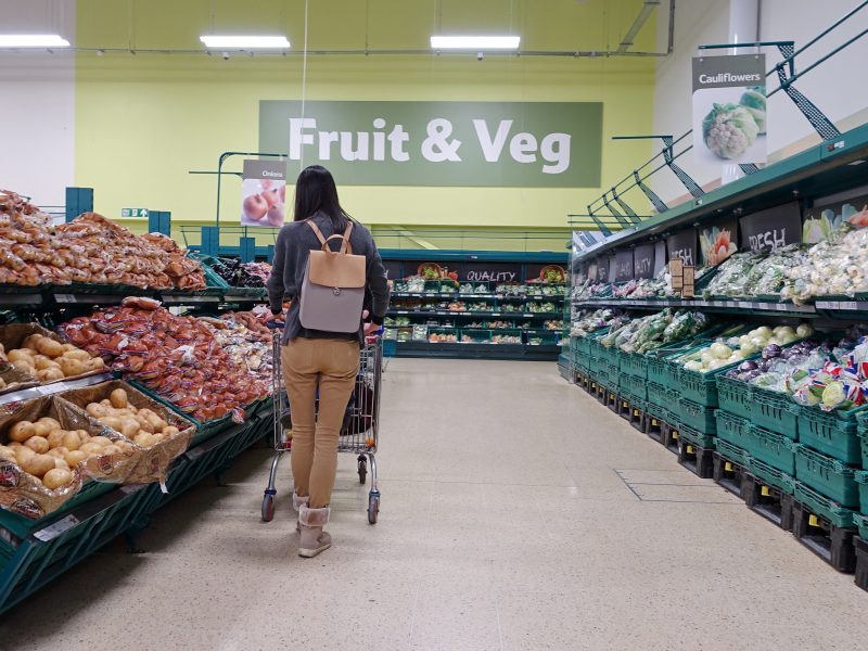 Tesco has backed calls for the government to place a ban on plastic packaging for fruit and veg, arguing it would create a "level playing field", her showing a fruit and veg aisle