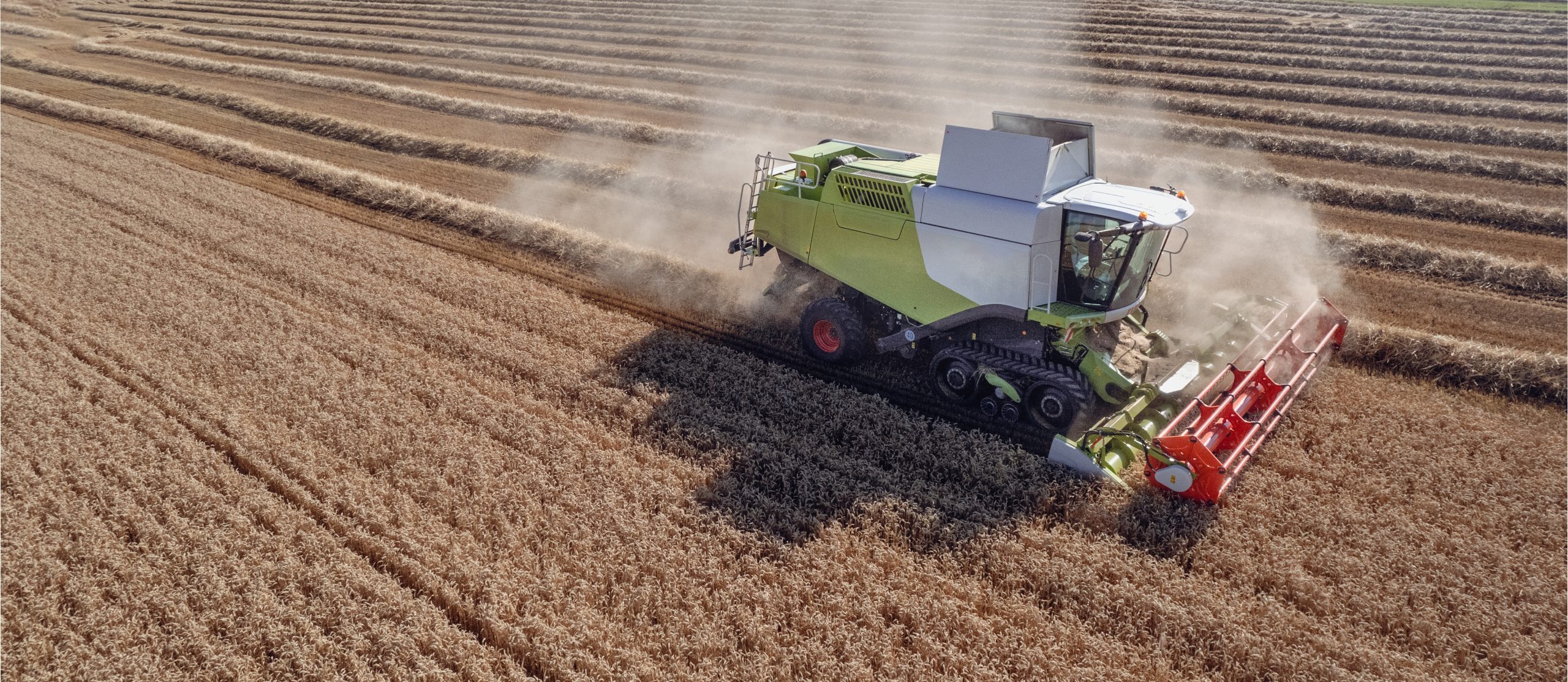 Climate crisis and rising energy prices have seen household food bills soar by over £600, with experts warning that it could increase even further, here depicting a tractor in a wheat field