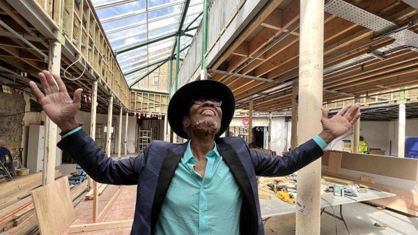 Urban farm shop The Black Farmer is to open its first permanent retail site in London's Brixton Village later this year, here depicting Wilfred Emmanuel-Jones MBE, here in a store's construction site