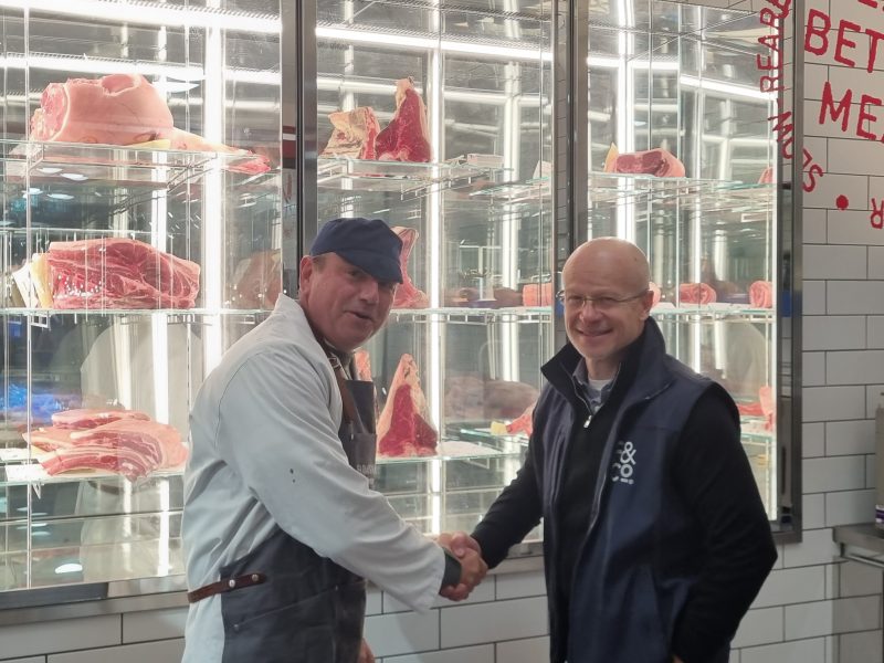 Sustainable online butcher Farmison & Co is relaunching its Ripon butchers counter and click and collect points, here depicting the counter and Andy and Paul